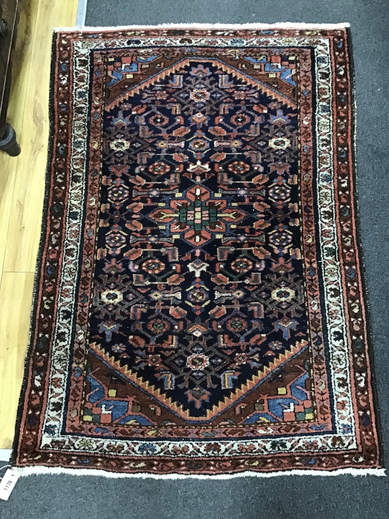 A North West Persian blue ground rug, 136 x 92cm